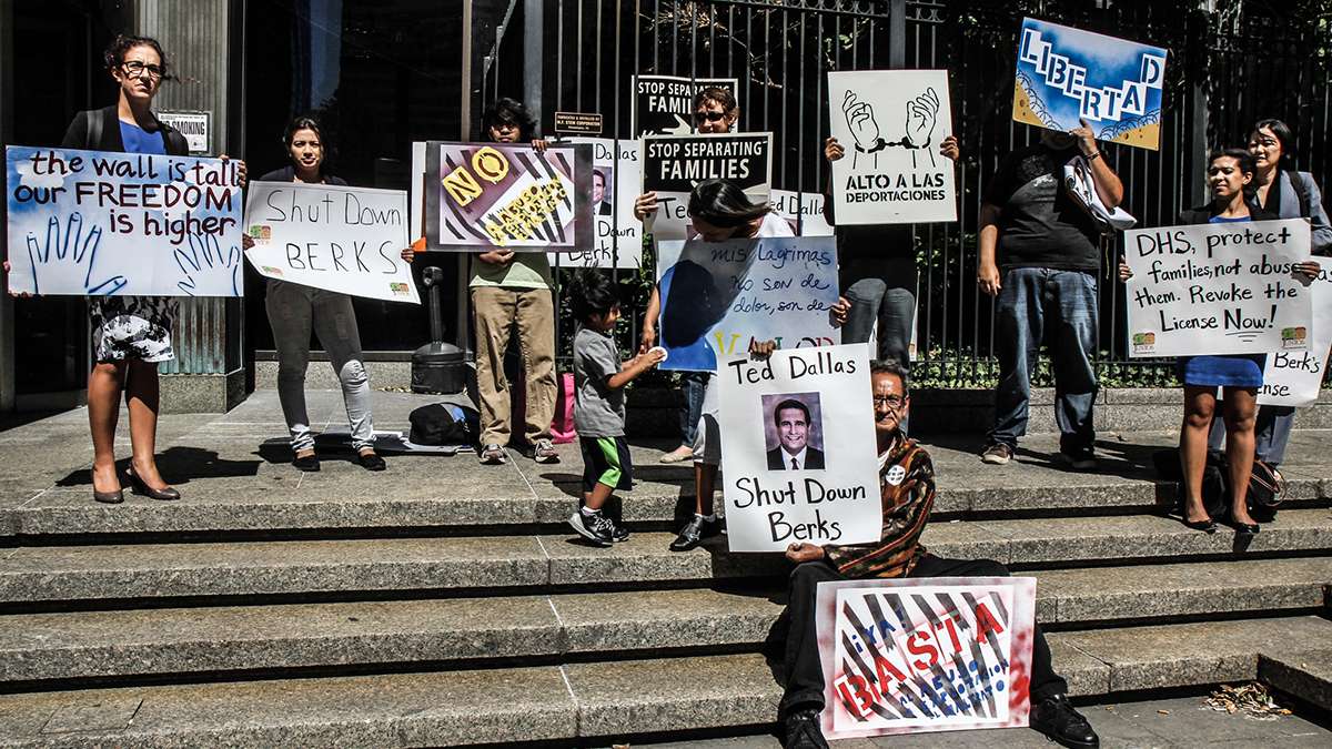 Supporters of undocumented immigrants participate in a protest outside the Philadelphia Department of Human Services in September. (Kimberly Paynter/WHYY