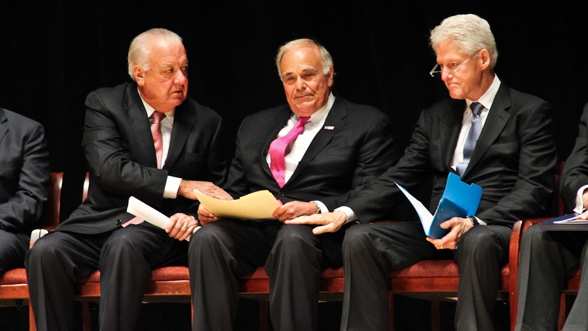  Patrick O'Connor (left) and former President Bill Clinton comfort former Pennsylvania Governor Ed Rendell at a memorial service for Lewis Katz Wednesday. (Kimberly Paynter/WHYY) 