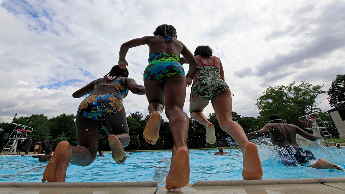 Children play at Kelly Pool in Philadelphia. (Matt Rourke/AP Photo) 