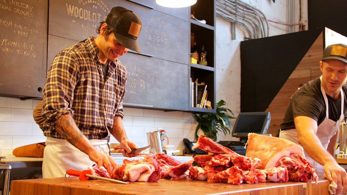 Kensington Quarters head butcher Bryan Mayer, carving up some beef. (Nathaniel Hamilton/Newsworks.org)