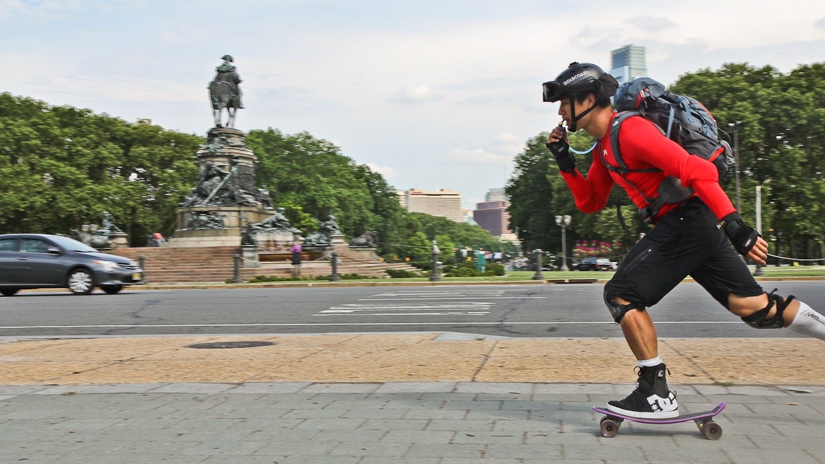 Cross-country skateboarder Kevin Kreider learned how to skate in December of 2013, and started his journey on April 15th 2013. He arrived in Philadelphia on July 10th. (Kimberly Paynter/WHYY)