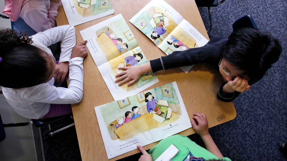  Kindergarten students work on reading skills. Pennsylvania law doesn't require schools to offer kindergarten, and allows those that do to impose enrollment deadlines. (AP file Photo/Elaine Thompson) 