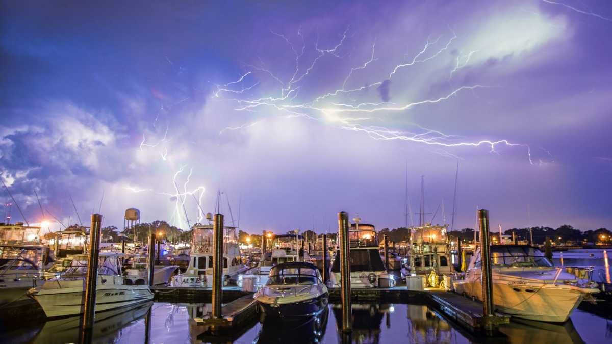 A lightning storm over the Belmar Marina in July 2014 by Victor Bubadias Photography.