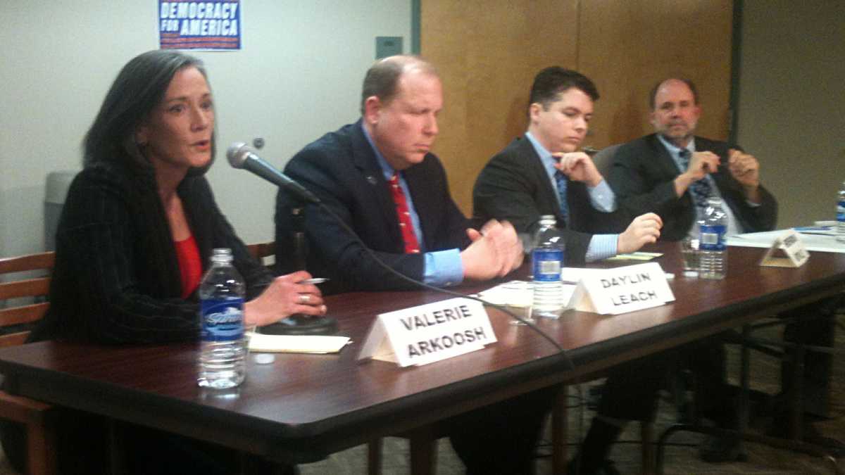  Congressional candidates Valerie Arkoosh, Daylin Leach, and Brendan Boyle join moderator Will Bunch (right) at a forum in January. (Dave Davies/WHYY, file) 