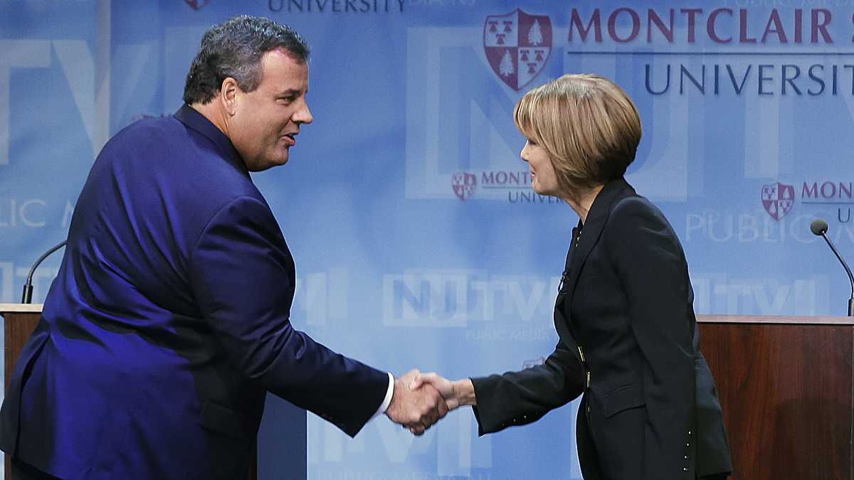  Republican New Jersey Gov. Chris Christie, left, greets Democratic challenger Barbara Buono at the start of their debate at Montclair University in Montclair, N.J., Tuesday, Oct. 15, 2013. (AP Photo/Mel Evans) 