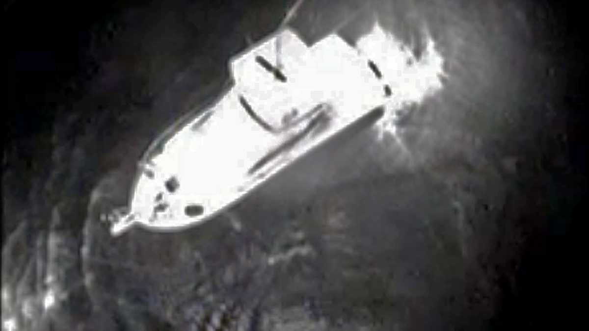  View from a Coast Guard helicopter showing a boat near where the man was discovered. (Image courtesy of the US Coast Guard) 
