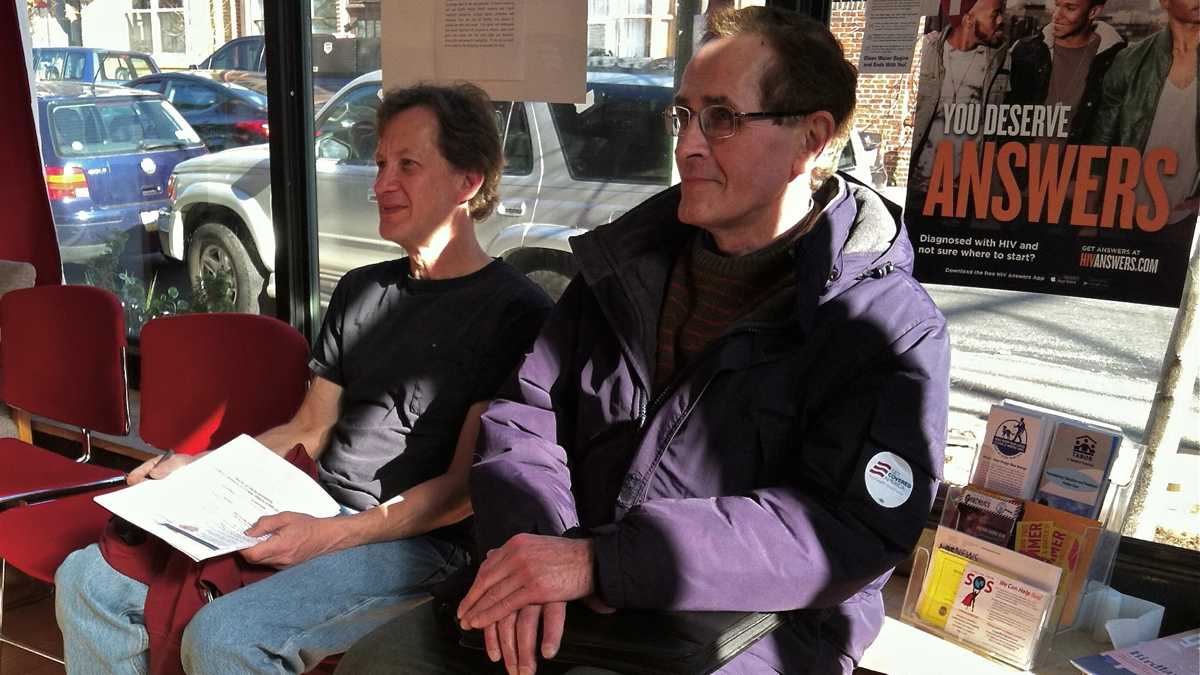  Joseph Krakauskas, 62, right, of Philadelphia,  enrolled in a personal choice Independence Blue Cross silver plan through the Marketplace last year. He'll be playing more this year, but not as much as he initially thought. (Elana Gordon/WHYY) 