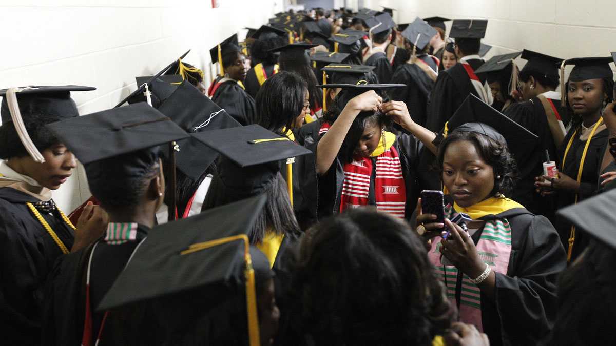 Members of Temple University's Class of 2011 wait to begin their graduation march.  (AP photo/Matt Rourke)