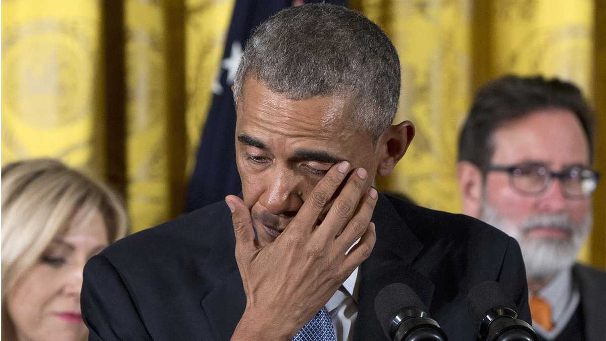  President Barack Obama wipes away tears from his eyes as he recalled the 20 first-graders killed in 2012 at Sandy Hook Elementary School, while speaking in the East Room of the White House in Washington Tuesday. (AP Photo/Carolyn Kaster) 