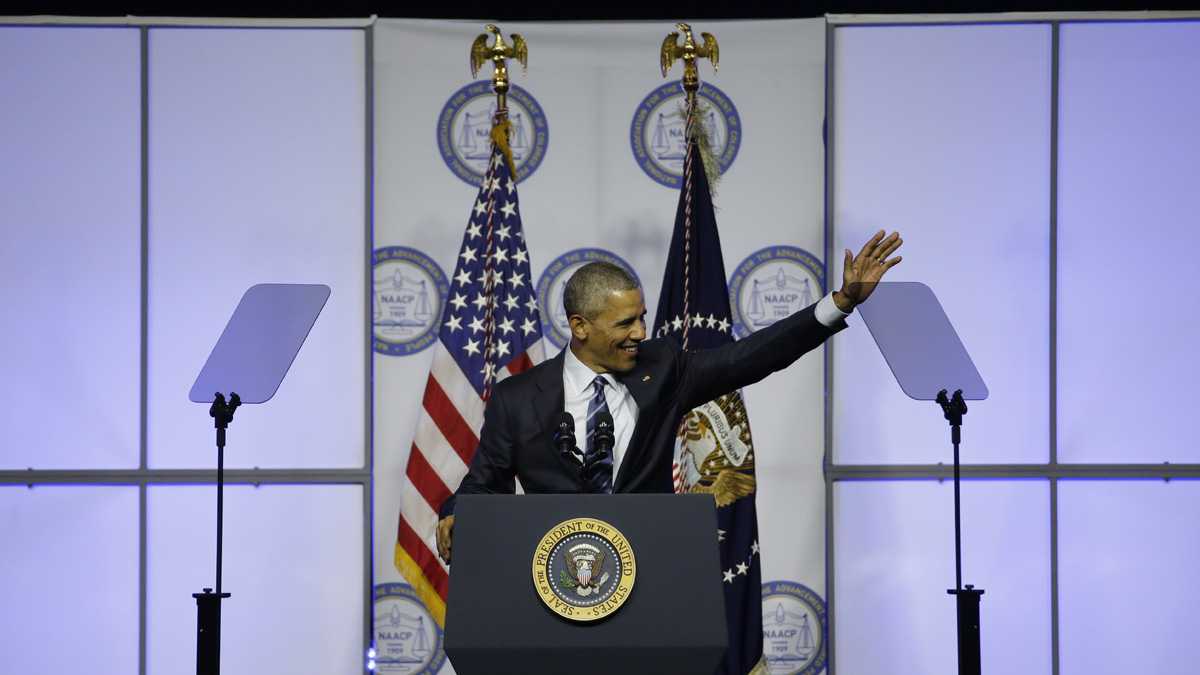  President Barack Obama waves before speaking at the NAACP's 106th Annual National Convention, Tuesday in Philadelphia. (AP Photo/Matt Slocum) 