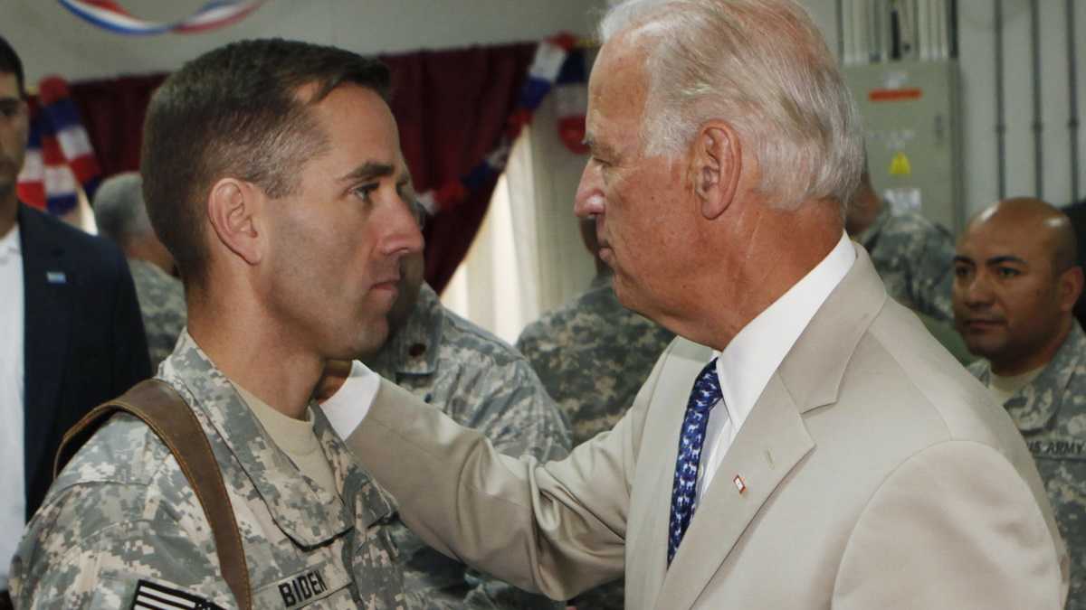 Vice President Joe Biden visits his son Beau during his tour in Iraq in 2008. Beau Biden, the former Delaware Attorney General, died of brain cancer in 2015. (AP Photo/Khalid Mohammed, Pool) 