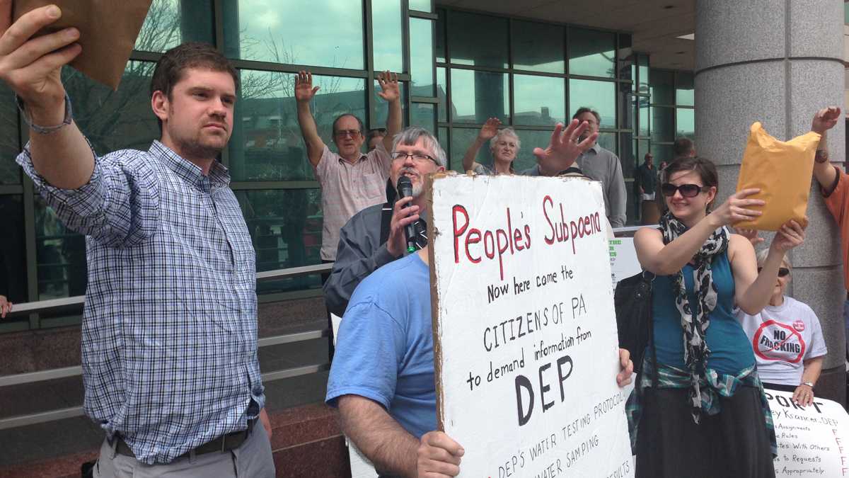  Protesters are shown outside of the DEP's Harrisburg headquarters in April 2013. Auditors criticize the department for communicating poorly with citizens who complained about water issues related to gas development. (Marie Cusick/StateImpact Pennsylvania) 