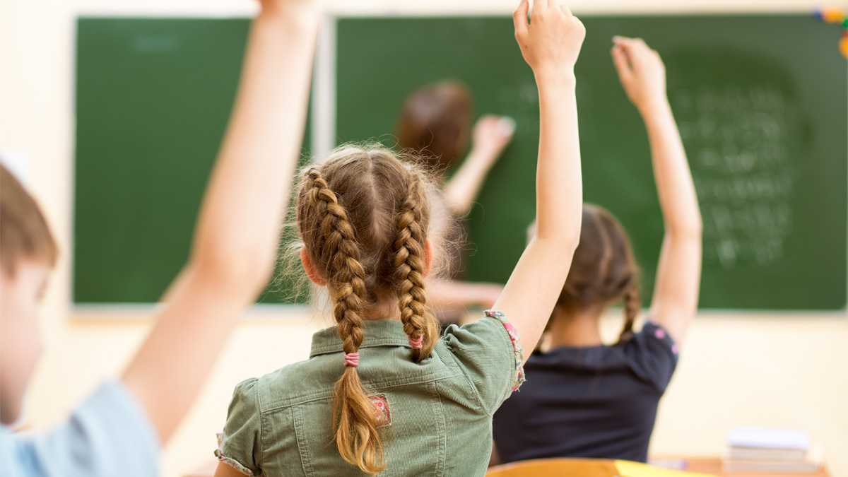 School children in classroom. (via ShutterStock) 