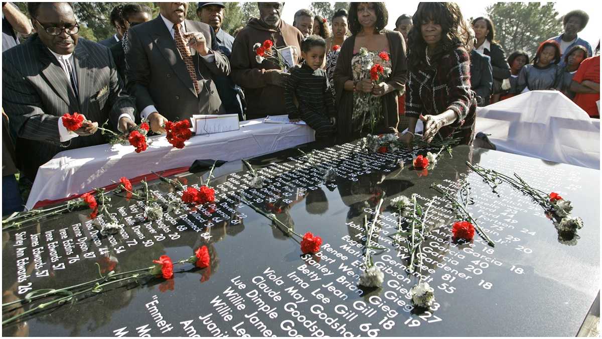  Jonestown memorial at the Evergreen cemetery in Oakland, CA (AP Photo/Eric Risberg) 