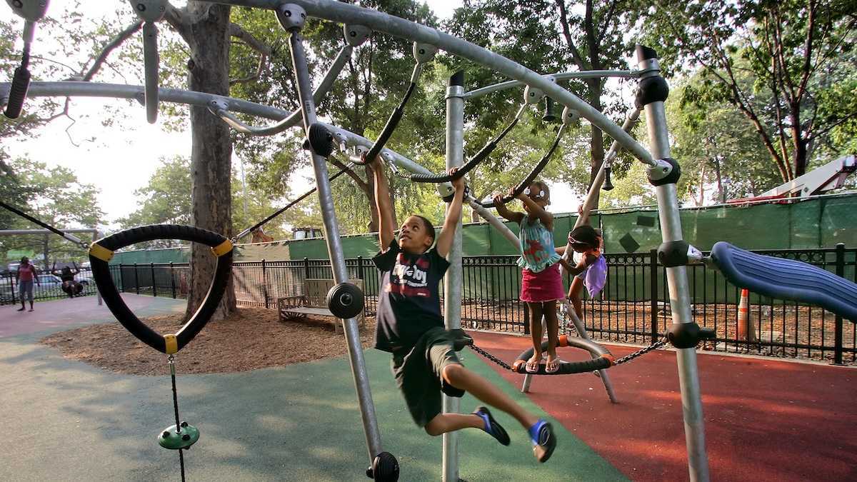  Children enjoy the warm weather in the playground at Franklin Square in Philadelphia. Friday will be another 