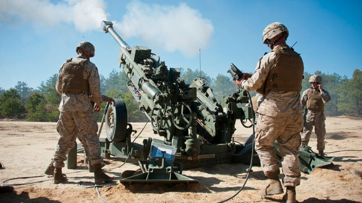  Marines from Golf Battery 3rd Battalion, 14th Marine Regiment, conduct artillery training May 4, 2013, on the Joint Base McGuire-Dix-Lakehurst ranges. The unit conducted 155 mm artillery training using their primary weapon system, M777A2 howitzer. (Photo: U.S. Air Force Staff Sgt. David Carbajal) 