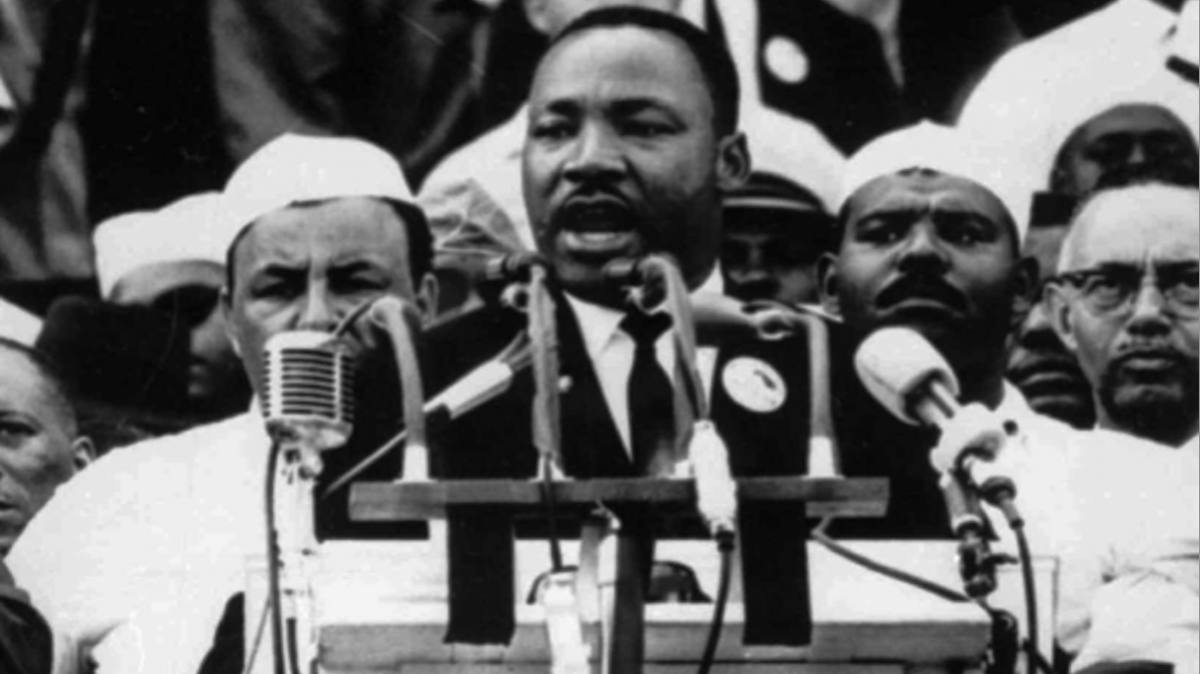  In this Aug. 28, 1963 file photo, Dr. Martin Luther King Jr., head of the Southern Christian Leadership Conference, addresses marchers during his 