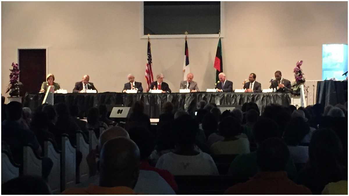 Photo from Monday's mayoral debate at Ezion Fair Baptist Church in Southbridge consisted of a packed panel including: current Mayor Dennis Williams