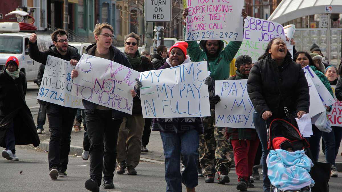 Protesters rally for higher wages and a union for fast food workers during a protest in front of the Broad Street McDonald's at Girard Avenue in March 2014. (Emma Lee/WHYY)