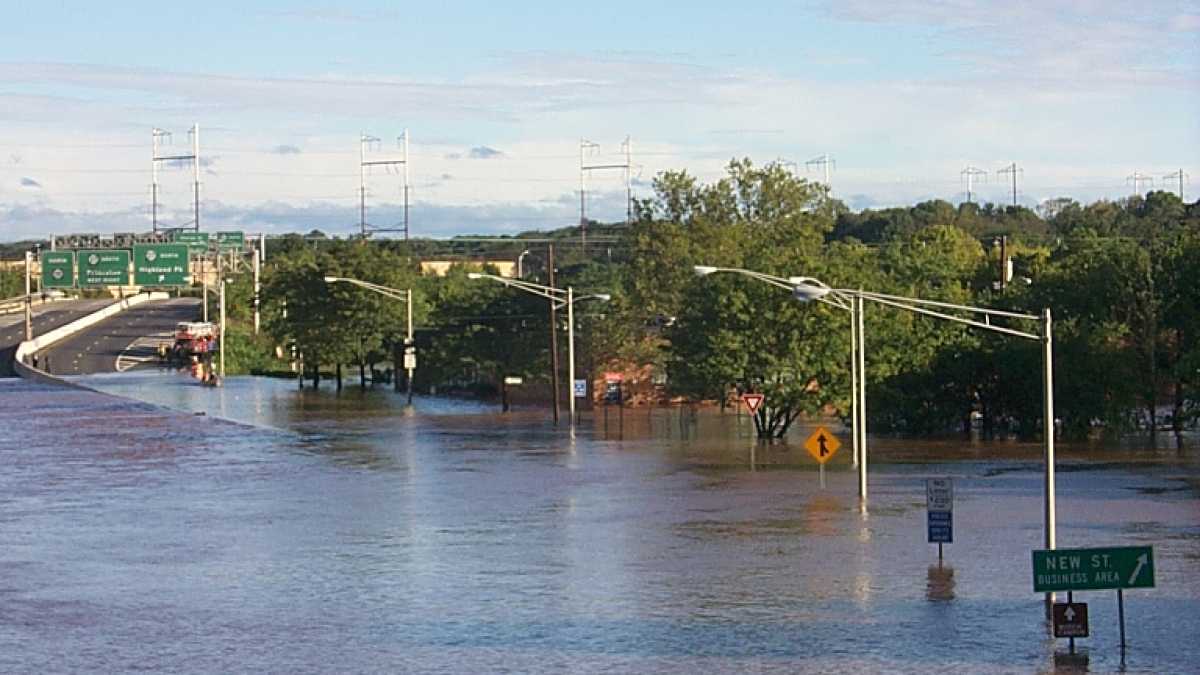  The Raritan River and Delaware and Raritan Canal spilled into Route 18 in New Brunswick following excessive rainfall from Tropical Storm Floyd. (Image: John Hasse/Rutgers University Department of Geography) 