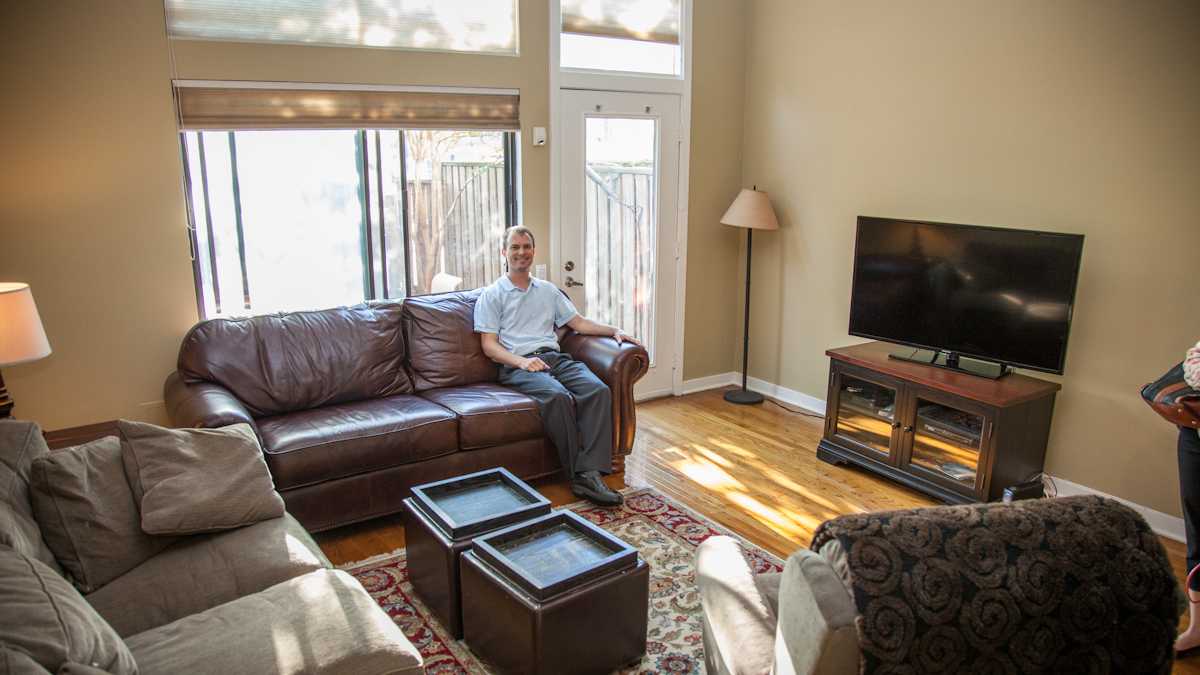 A Philadelphia resident in the Art Museum neighborhood shows off his home