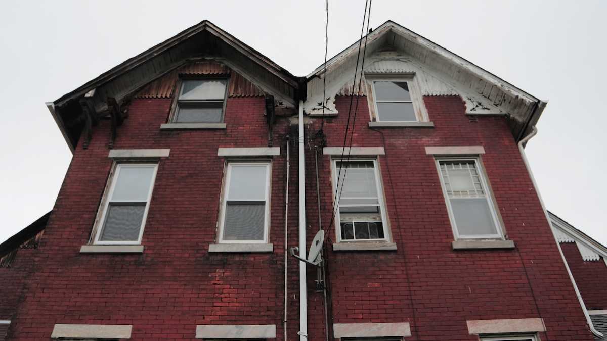  The twin homes at 145-147 Sumac St. are described as rare examples of Eastlake Victorian architecture. (Bas Slabbers/for NewsWorks) 