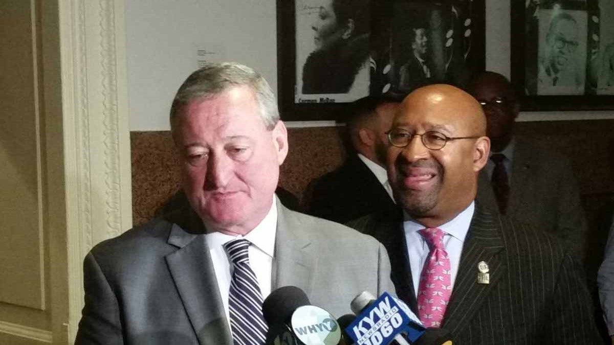  Democratic mayoral nominee Jim Kenney and Mayor Michael Nutter put aside differences with some laughs  Thursday. (Tom MacDonald/WHYY)  