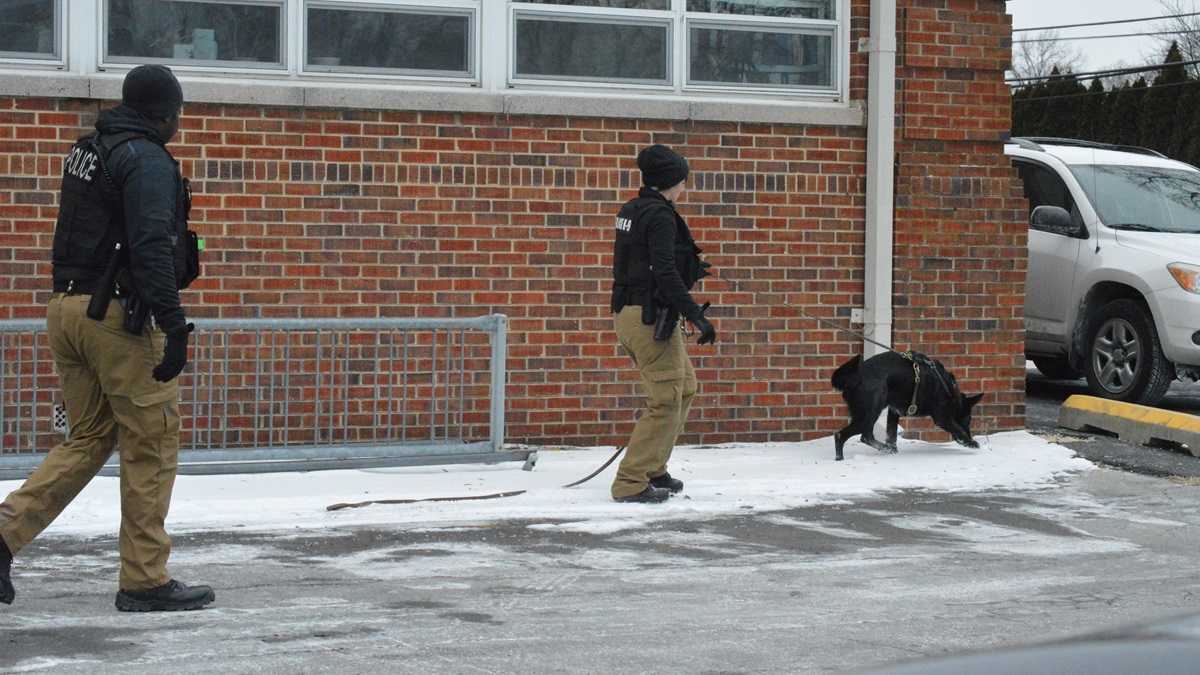  Police search for clues following the shooting at Rosehill Community Center earlier this month. (John Jankowski/for NewsWorks) 