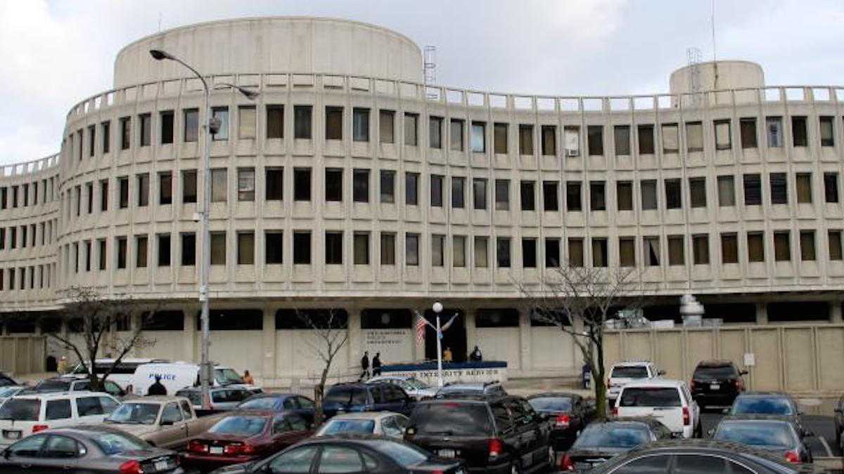 Two Jewish police officers are suing the Philadelphia Police Department, headquartered at Seventh and Race streets, what they say is systemic anti-Semitic harassment. (WHYY file photo)