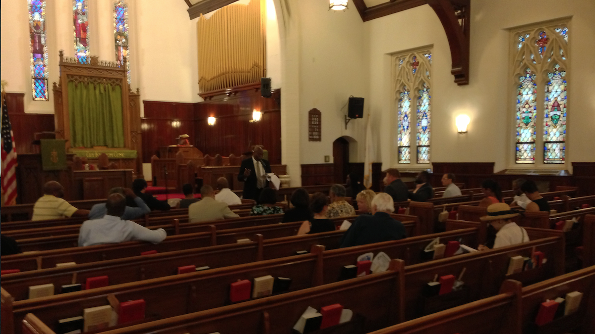  Representatives from 15 community groups with ties to Germantown High School gathered to discuss Camelot Schools' proposal to lease the building in late July. (Brian Hickey/WHYY, file) 