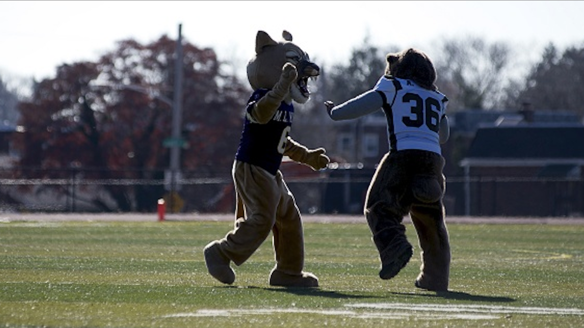  Mascots from MLK High and the since closed Germantown High on the field during the teams' Thanksgiving game last year. (Bas Slabbers/for NewsWorks) 
