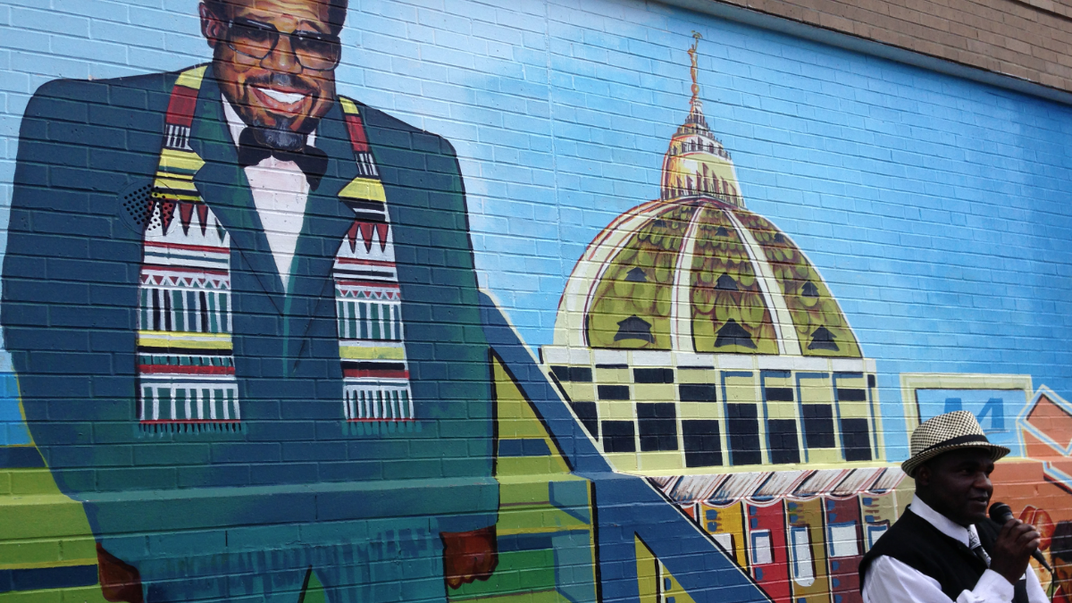 The Northwest Raiders and Mt. Airy Bantams are collaborating to raise money to build new facility. It would be named after late state Rep. David Richardson, shown here in a Chelten Ave. mural. (Brian Hickey/WHYY) 