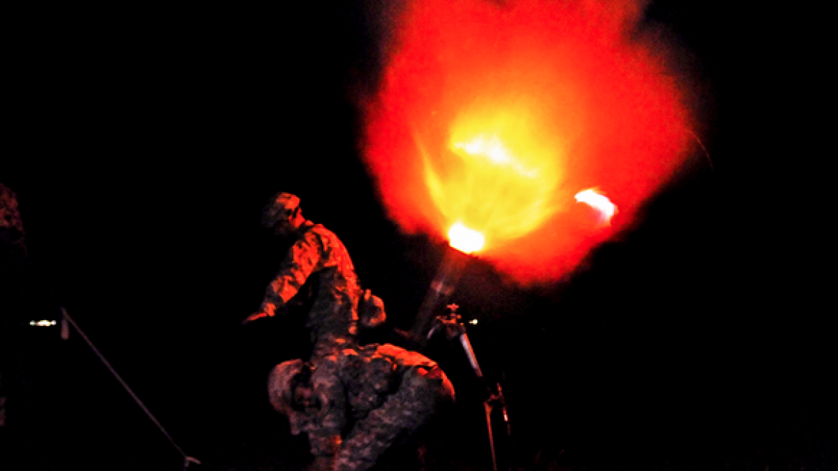  Soldiers fire a round from a 120mm illumination mortar system during a night training mission on Camp Santiago Joint Maneuver Training Center in Salinas, Puerto Rico, on July 14, 2013. (Photo: U.S. Army Staff Sgt. Joseph Rivera Rebolledo) 