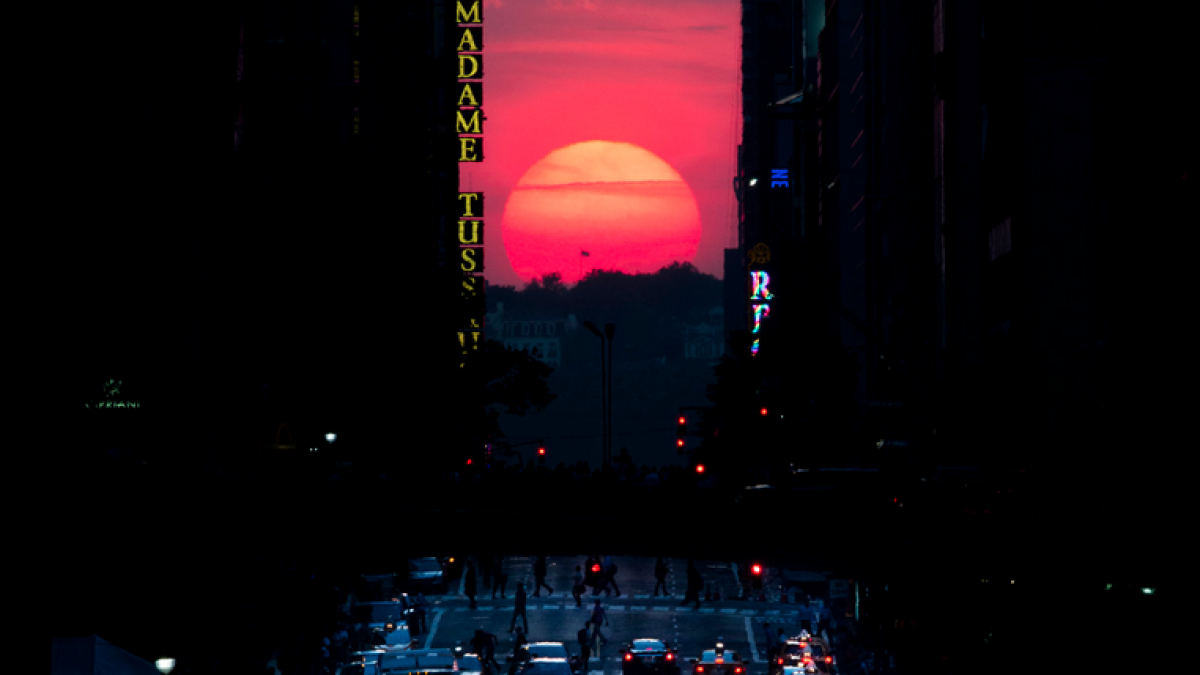  The sun sets along 42nd Street in Manhattan during an annual phenomenon known as 