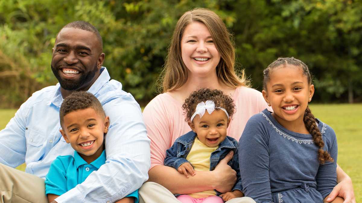 (Family in park photo via ShutterStock)