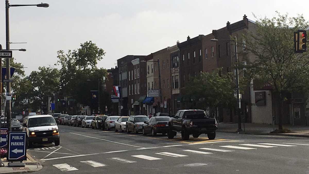 Vehicles are parked in the median of South Broad Street in Philadelphia
