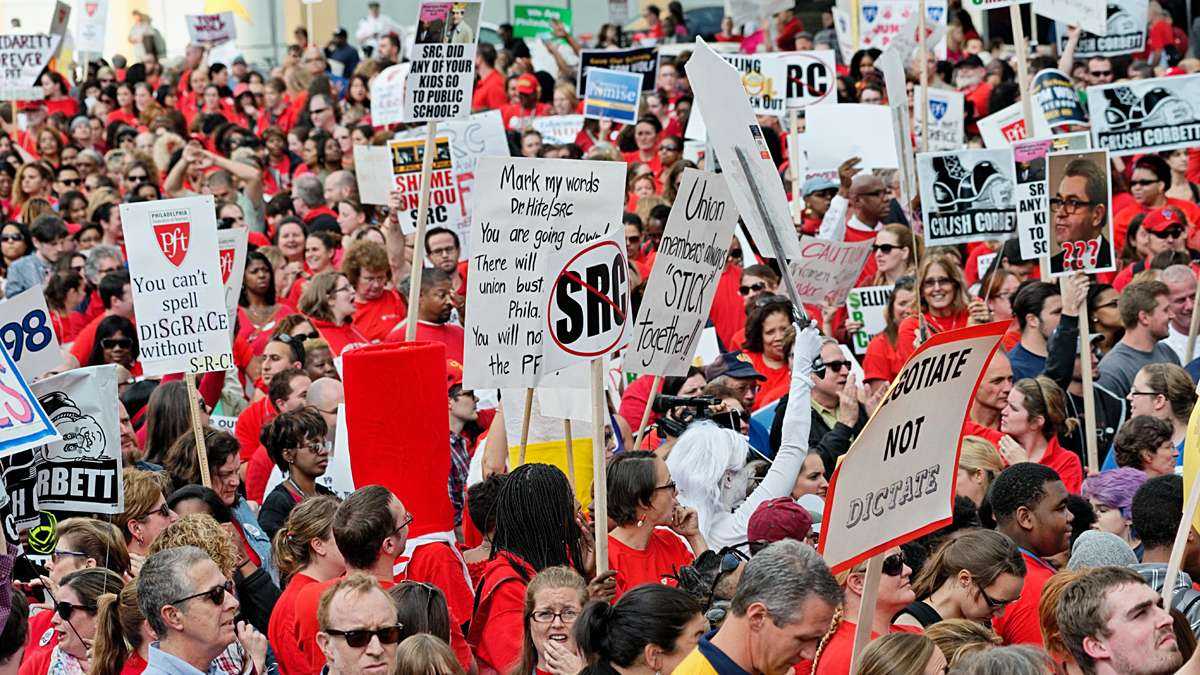 Members of the Philadelphia Federation of Teachers protest the School Reform Commission's cancellation of their contract in 2014. The Pennsylvania Supreme Court agrees with lower court rulings that the move was invalid. (NewsWorks file photo)