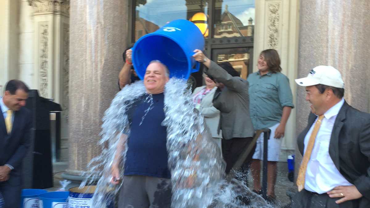  New Jersey Senate President Steve Sweeney is dressed appropriately for the ice bucket challenge to benefit ALS research. The dousing took place Monday on the steps of the Statehouse in Trenton. (Phil Gregory/ WHYY) 