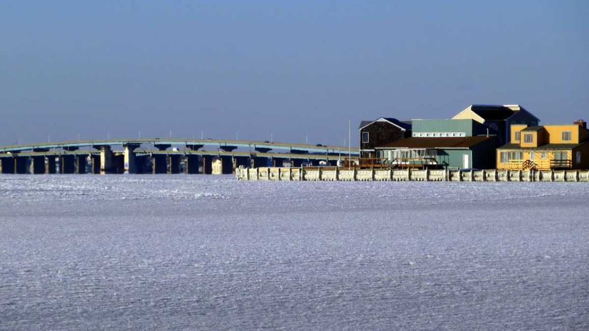 The frozen Barnegat Bay and the Mathis Bridge in the background as seen from Seaside Park on Jan. 7