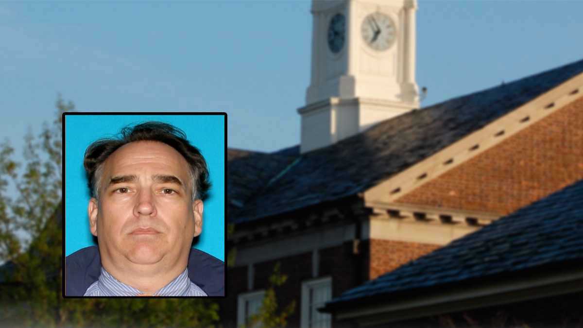  An arrest warrant has been issued for former Tower Hill School headmaster Christopher Wheeler, who faces 25 counts of dealing in child pornography. 
