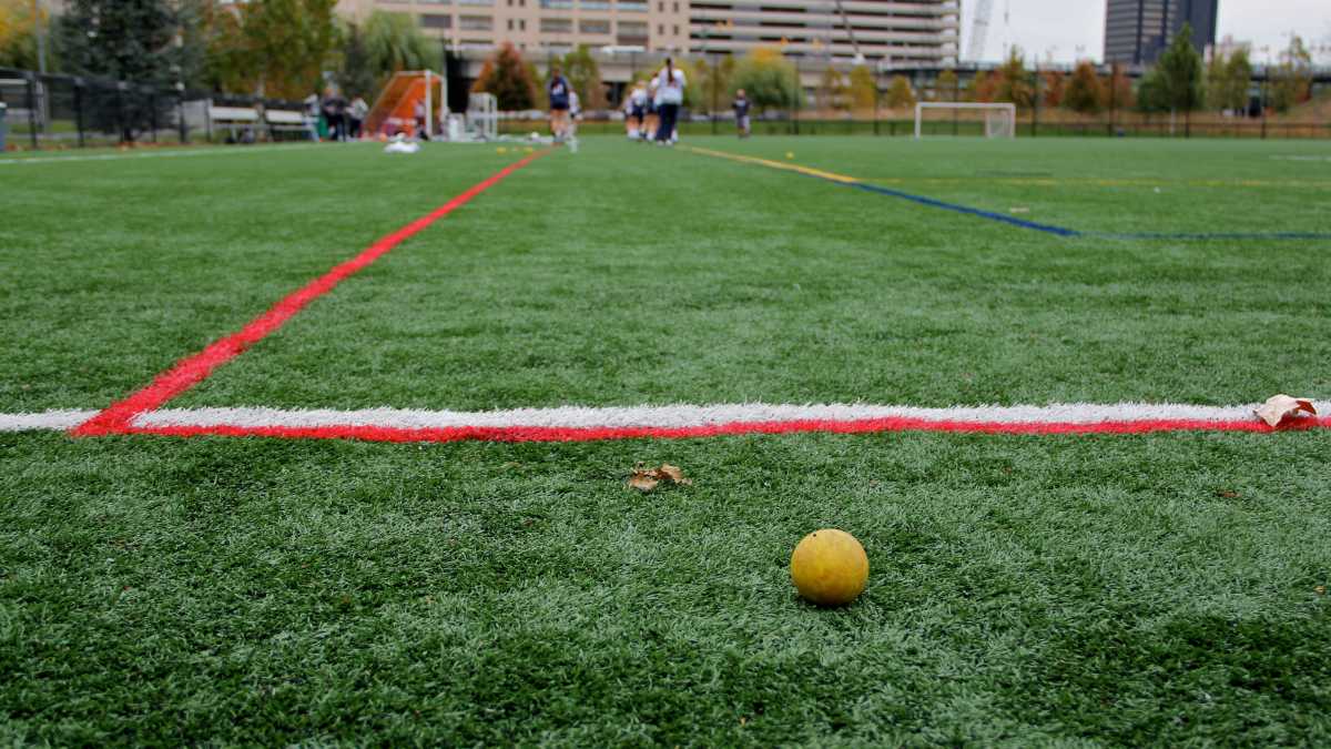 An artificial turf practice field at the University of Pennsylvania. (Emma Lee / WHYY)