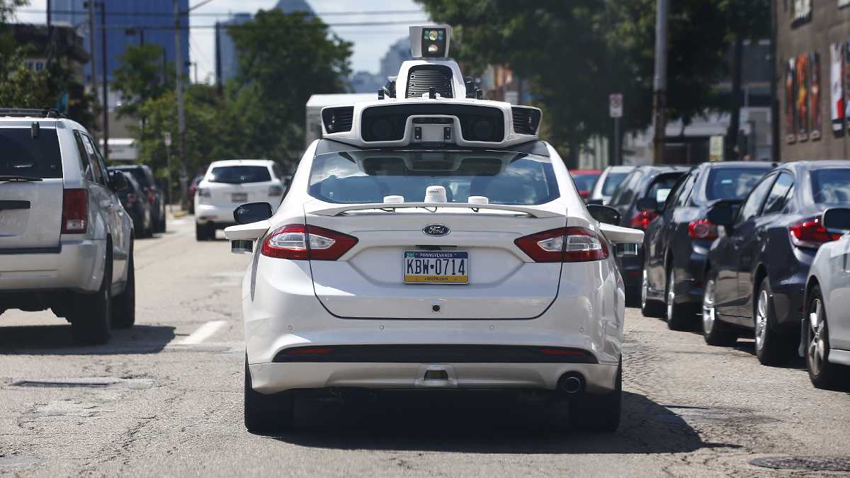 A self-driving Ford Fusion hybrid is test driven. (AP Photo/Jared Wickerham)