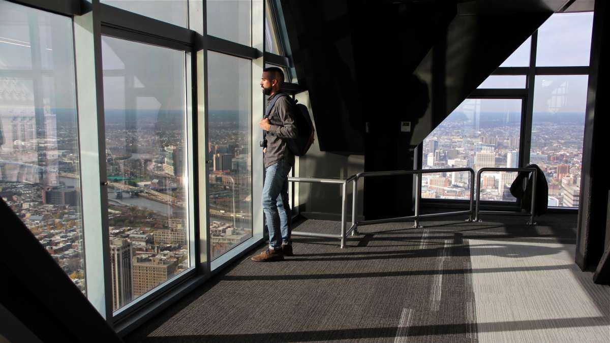 A visitor takes in the view during a press preview. (Emma Lee/WHYY)