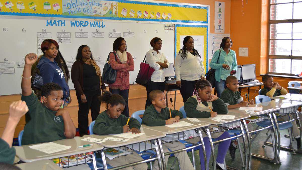 Parents tour a classroom at Kenderton Elementary. (Kevin McCorry/WHYY