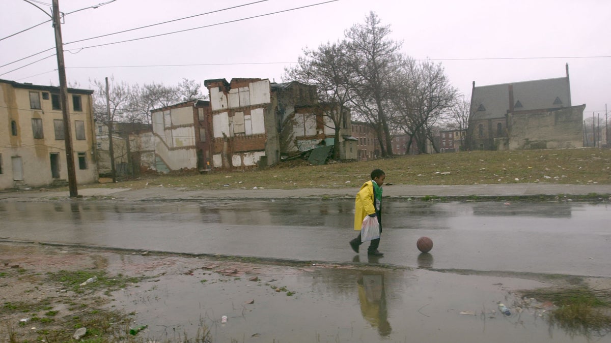 Michael Witherspoon walks home past abandoned rowhomes and empty lots in north Philadelphia. The 2010 census estimated that Pennsylvania has nearly 400,000 vacant properties, about 20,000 of which are in Pittsburgh and 40,000 in Philadelphia.  (AP File Photo/Dan Loh) 