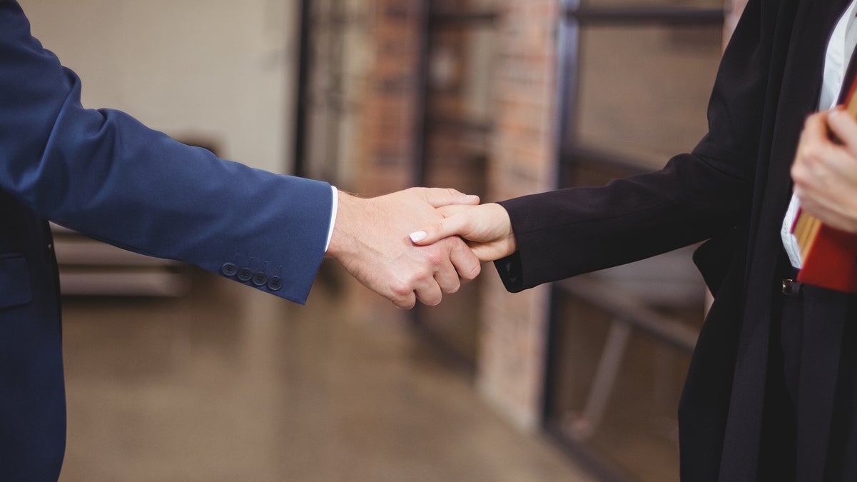 (<a href='http://www.bigstockphoto.com/image-123743294/stock-photo-midsection-of-female-lawyer-handshaking-with-client-while-standing-in-office'>Big Stock Photo</a>)