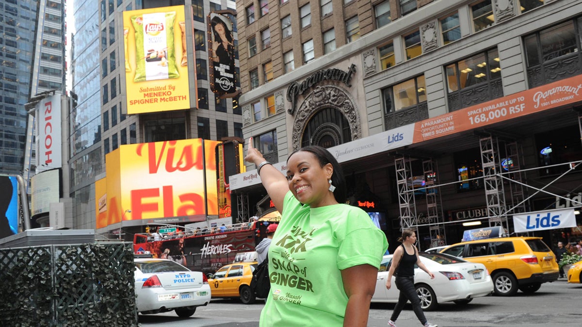  Meneko Spigner McBeth points to a billboard advertising her flavor in Lay's 