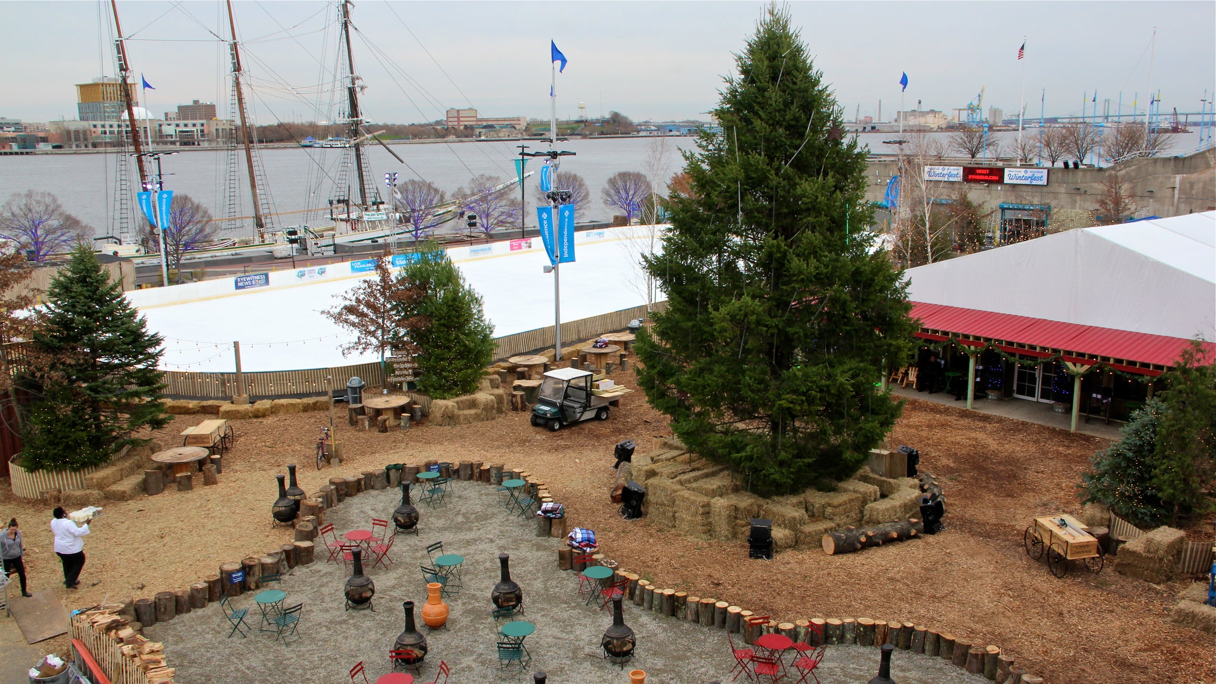 Winterfest picks up where Spruce Street Harbor Park left off, repurposing themes and elements to create a ski lodge fantasy on the Delaware. (Emma Lee/WHYY)