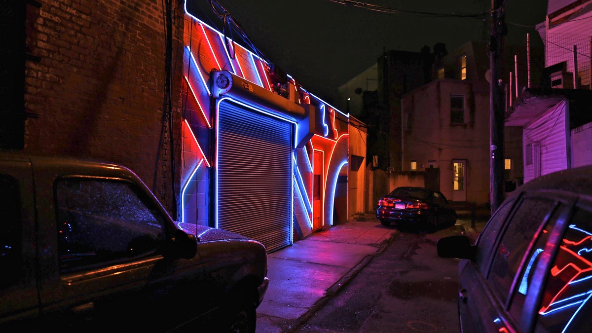 The neon mural ''Electric Street'' illuminates a narrow, discontiguous section of Percy Street in South Philadelphia. (Conrad Benner)