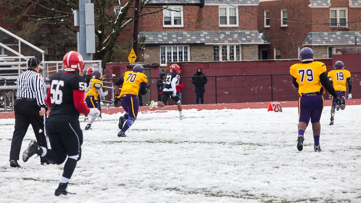 DJ Moore runs for another Imhotep touchdown during this year's Thanksiving Day Legacy Bowl. (Brad Larrison/for NewsWorks)